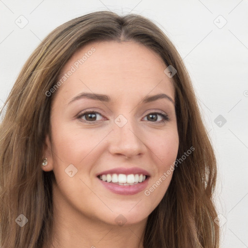 Joyful white young-adult female with long  brown hair and grey eyes