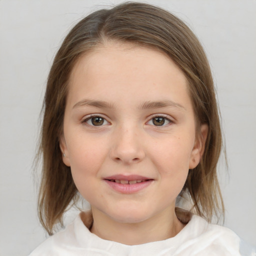 Joyful white child female with medium  brown hair and brown eyes