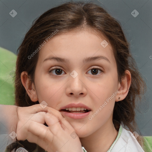 Joyful white child female with medium  brown hair and brown eyes