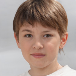 Joyful white child female with short  brown hair and brown eyes