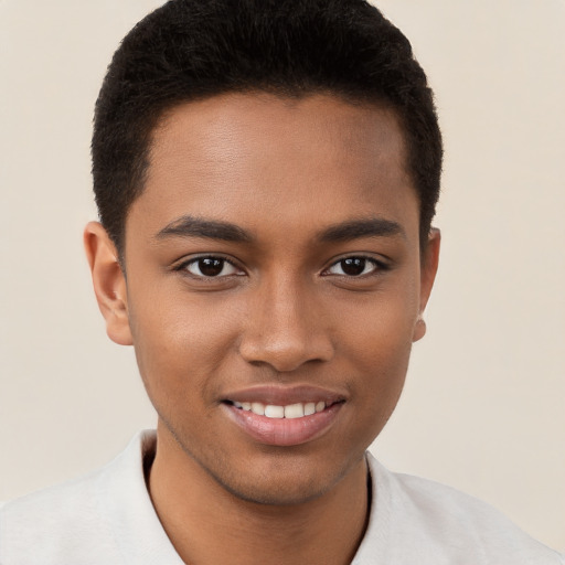 Joyful black young-adult male with short  brown hair and brown eyes