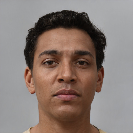 Neutral latino young-adult male with short  brown hair and brown eyes
