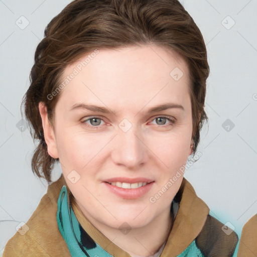 Joyful white young-adult female with medium  brown hair and blue eyes