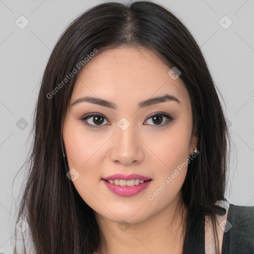 Joyful asian young-adult female with long  brown hair and brown eyes