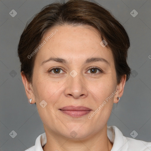 Joyful white adult female with short  brown hair and brown eyes