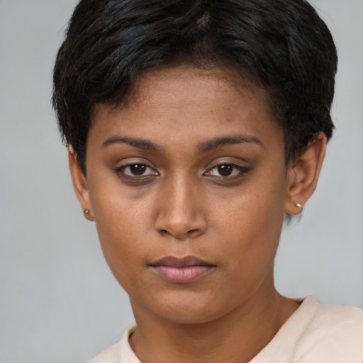 Neutral latino young-adult female with short  brown hair and brown eyes
