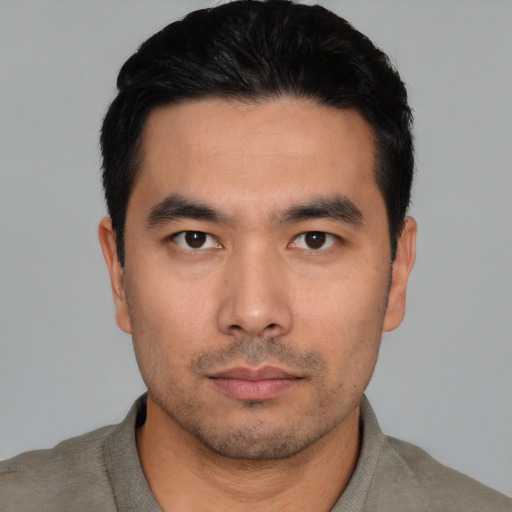 Neutral asian young-adult male with short  black hair and brown eyes