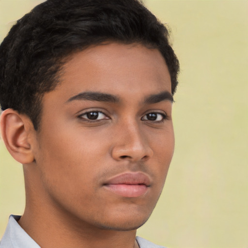 Neutral latino young-adult male with short  brown hair and brown eyes