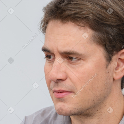 Neutral white adult male with short  brown hair and brown eyes