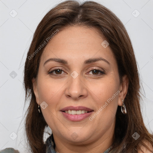 Joyful white adult female with medium  brown hair and brown eyes