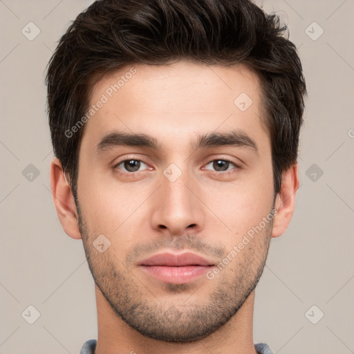 Neutral white young-adult male with short  brown hair and brown eyes