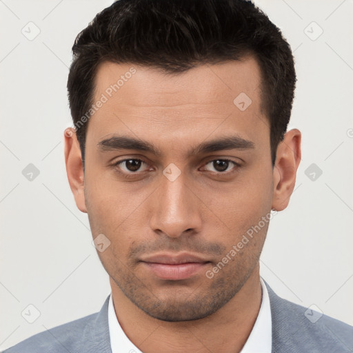 Neutral white young-adult male with short  brown hair and brown eyes