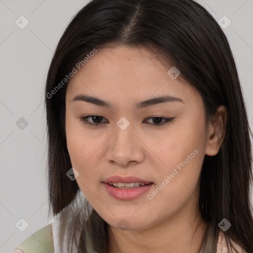 Joyful asian young-adult female with long  brown hair and brown eyes