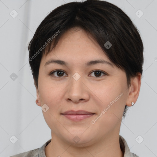 Joyful white young-adult female with medium  brown hair and brown eyes