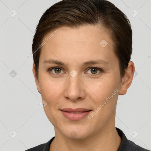 Joyful white adult female with short  brown hair and grey eyes