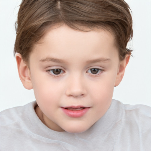 Joyful white child female with short  brown hair and brown eyes