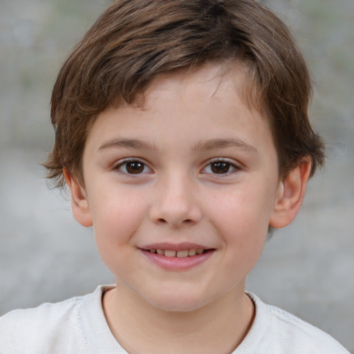 Joyful white child male with short  brown hair and brown eyes