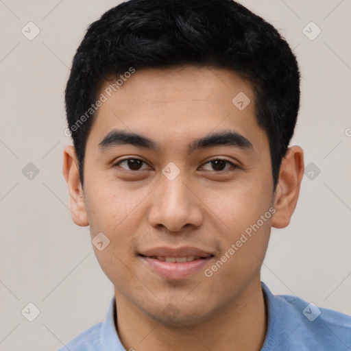 Joyful asian young-adult male with short  black hair and brown eyes