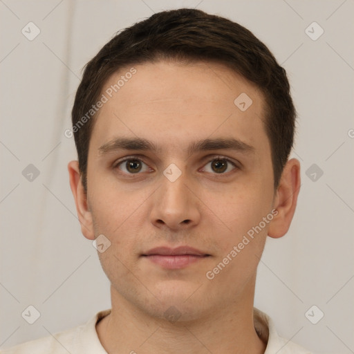 Neutral white young-adult male with short  brown hair and brown eyes