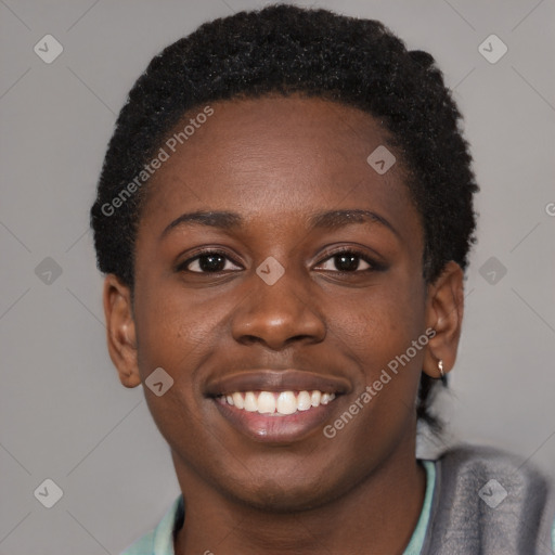 Joyful black young-adult female with short  brown hair and brown eyes