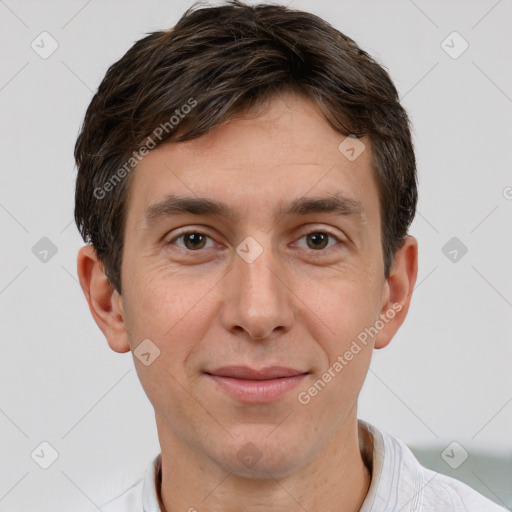 Joyful white adult male with short  brown hair and brown eyes