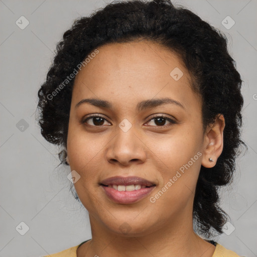Joyful latino young-adult female with long  black hair and brown eyes