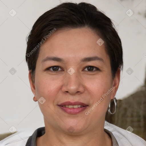 Joyful white adult female with short  brown hair and brown eyes