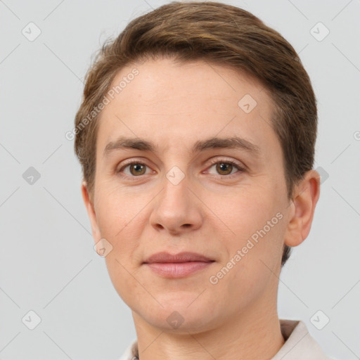 Joyful white adult female with short  brown hair and brown eyes