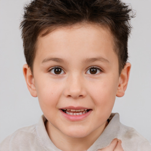 Joyful white child female with short  brown hair and brown eyes