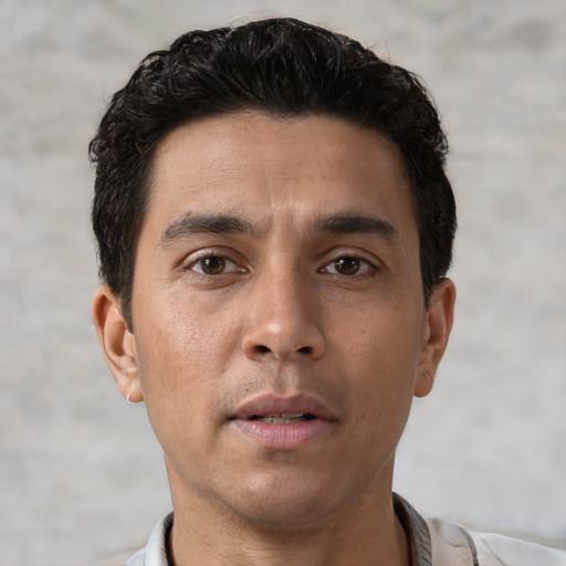 Neutral asian young-adult male with short  brown hair and brown eyes