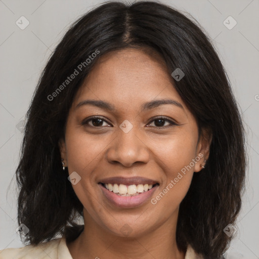 Joyful latino young-adult female with long  brown hair and brown eyes