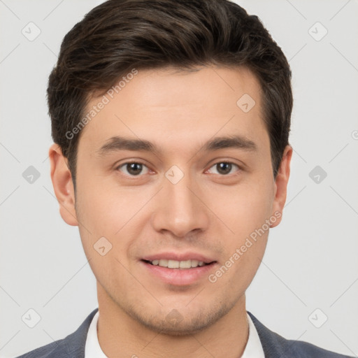 Joyful white young-adult male with short  brown hair and brown eyes