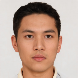 Neutral asian young-adult male with short  brown hair and brown eyes