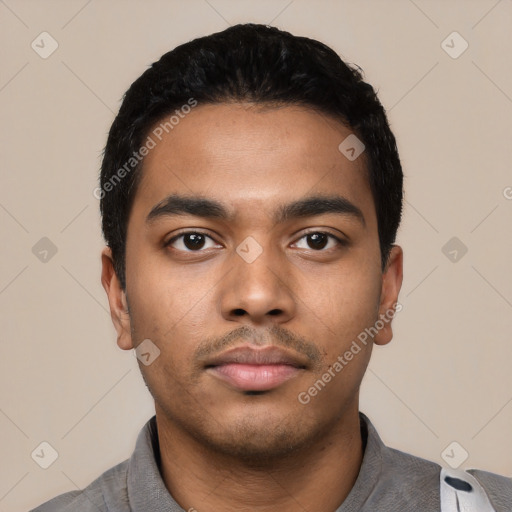 Neutral latino young-adult male with short  black hair and brown eyes