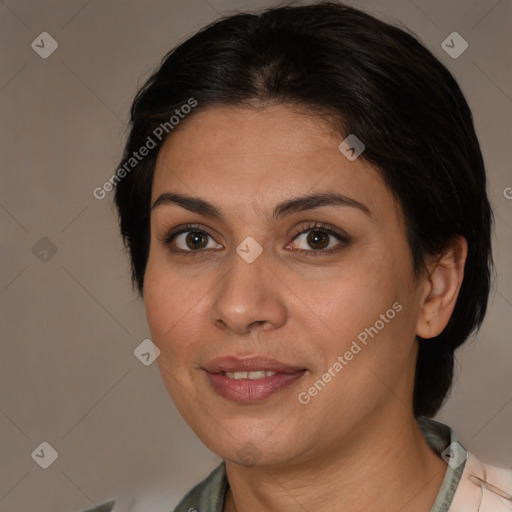 Joyful white adult female with medium  brown hair and brown eyes