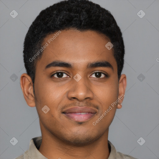 Joyful black young-adult male with short  brown hair and brown eyes