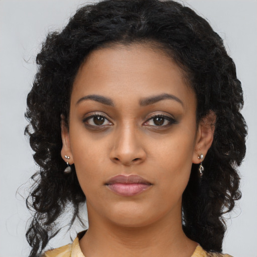 Neutral black young-adult female with long  black hair and brown eyes