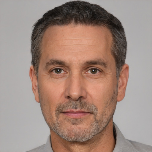 Neutral white middle-aged male with short  black hair and brown eyes