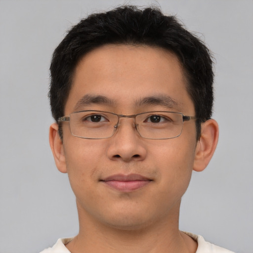 Neutral asian young-adult male with short  brown hair and brown eyes