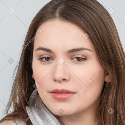 Neutral white young-adult female with long  brown hair and brown eyes