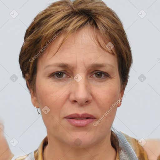 Joyful white adult female with short  brown hair and brown eyes