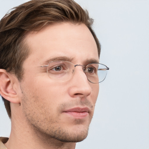 Neutral white young-adult male with short  brown hair and grey eyes