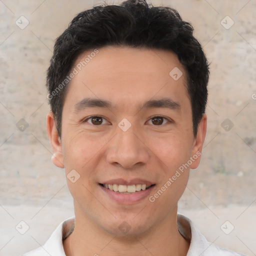 Joyful white young-adult male with short  black hair and brown eyes