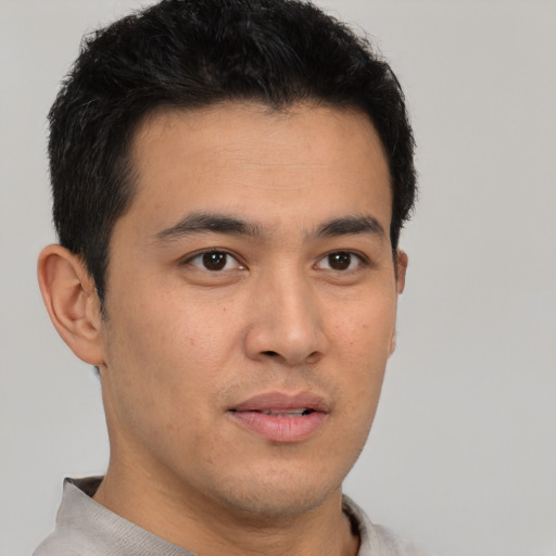 Neutral latino young-adult male with short  brown hair and brown eyes
