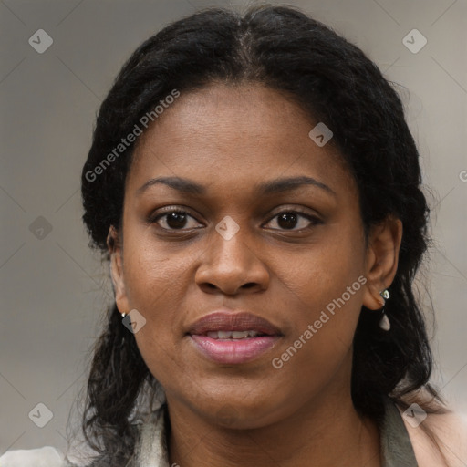 Joyful black young-adult female with medium  brown hair and brown eyes