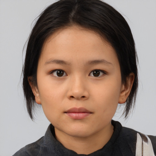 Neutral asian child female with medium  brown hair and brown eyes