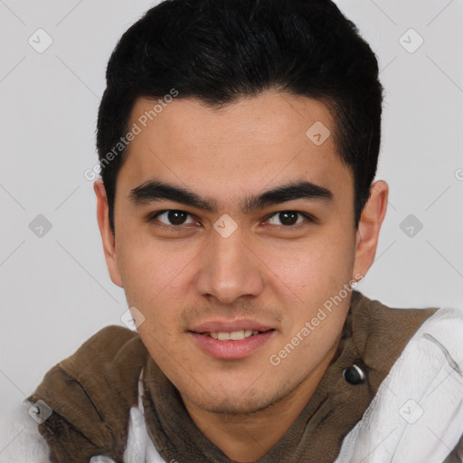 Joyful latino young-adult male with short  brown hair and brown eyes