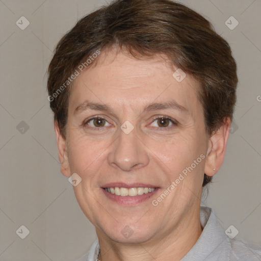 Joyful white adult female with short  brown hair and brown eyes