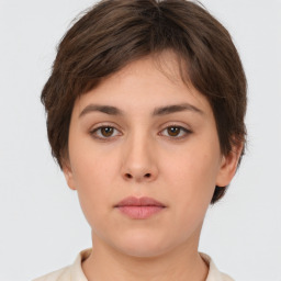 Neutral white young-adult female with short  brown hair and brown eyes