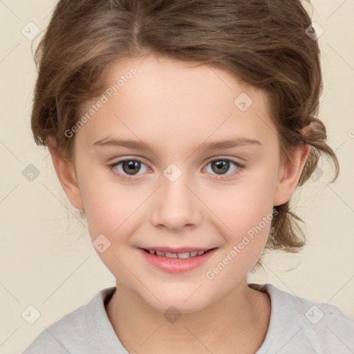 Joyful white child female with short  brown hair and brown eyes